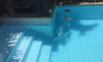 Imagem 2: Casa com piscina e sauna estilo buziano