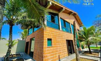 Imagem 3: Casa de frente para o mar com 3 suítes e área de lazer com piscina, churrasqueira e 4 vaga