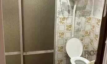 Imagem 6: Casa de madeira com 2 dormitórios no bairro Santa Cecília