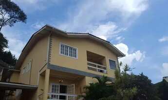 Imagem 2: Casa de condomínio para venda possui 400 metros quadrados com 5 quartos