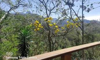 Imagem 2: Casa bem construída, com salão envidraçado e vista para montanhas!