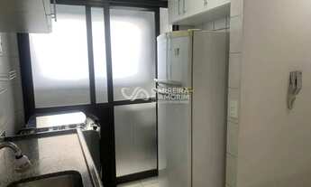 Imagem 3: Totalmente mobiliado, o imóvel já conta com itens essenciais, como máquina lava e seca