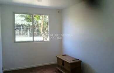 Imagem 3: Apartamento térreo de 1 dormitório com 42m2. Garagem próxima à venda(separada