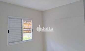 Imagem 7: Apartamento com 2 dormitórios para alugar, 70 m² por R$ 1.100/mês - Santa Mônica - Uberlân