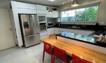 Imagem 6: Casa de condomínio para venda possui 490 metros quadrados com 5 quartos