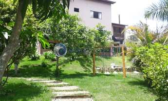 Imagem 4: Casa em condomínio fechado, com belo jardim na cidade de São Lourenço-MG