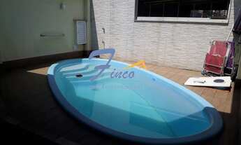 Imagem 2: Casa Térrea para Venda em Santos, Ponta Da Praia, 3 dormitórios, 2 suítes, 4 banheiros, 2