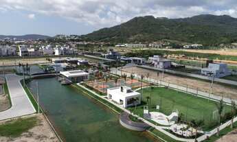 Imagem 3: Lote/Terreno em condomínio fechado com lago ao fundo do lote