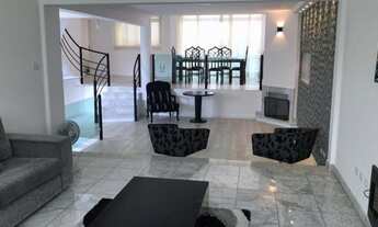 Imagem 6: Casa de condomínio para aluguel e venda possui 420 metros quadrados com 4 quartos