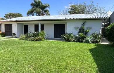 Imagem 2: Imóvel para venda tem 150 metros quadrados com 5 quartos em Centro - Xangri-Lá - RS