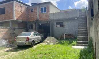 Imagem: Terreno com galpão em baixo e casa em cima