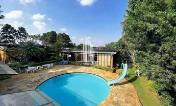 Imagem: Casa com 4 suites, piscina e quadra de tenis