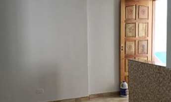 Imagem 5: Casa com quatro cômodos e garagem coberta