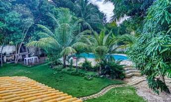 Imagem 4: Casa rústica com piscina numa área verde em Pipa