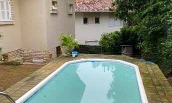 Imagem 7: Casa térrea com 3 dorms sendo 1 suíte salas estar e jantar, lavabo, cozinha, varanda, pisc