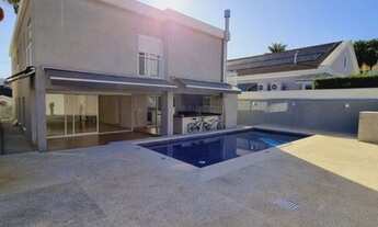 Imagem 2: Casa de condomínio para aluguel e venda possui 400 metros quadrados com 4 quartos