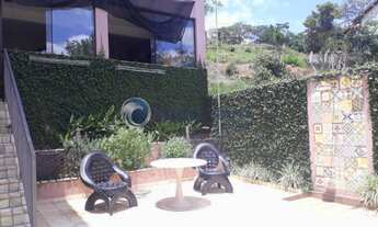 Imagem 3: Casa em condomínio fechado, com belo jardim na cidade de São Lourenço-MG