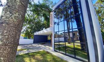 Imagem 2: Casa de condomínio para venda possui 212 metros quadrados com 3 quartos