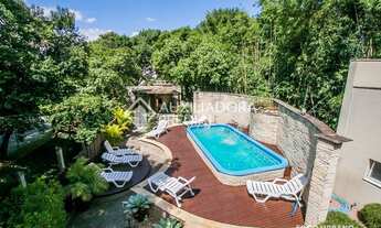 Imagem 3: Apartamento para venda tem 110 metros quadrados com 3 quartos em Auxiliadora - Porto Alegr