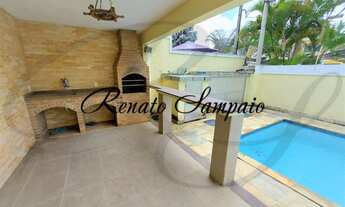 Imagem 5: Casa triplex em condomínio, com 4 suítes, sótão, piscina, sauna a vapor e vaga para 4 carr