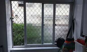 Imagem 5: Apartamento lateral de 2 dorms com garagem fechada em santos ( Embaré ) próx ao canal 5