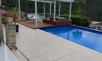 Imagem 5: Casa de condomínio para venda possui 449 metros quadrados com 4 quartos