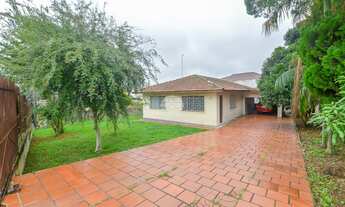 Imagem 2: Terreno de esquina com casa construída