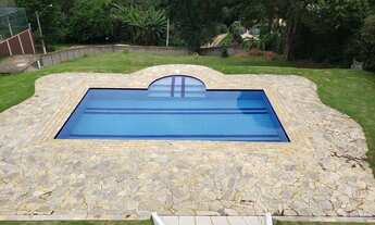 Imagem 3: Casa de condomínio para venda tem 500 metros quadrados com 5 quartos