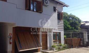 Imagem 2: Sobrado para comprar no bairro Santo Antônio - Porto Alegre com 3 quartos