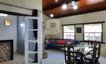 Imagem 2: Ampla casa com 3 quartos, sendo 1 suíte com piso em Porcelanato, churrasqueira e muito mai