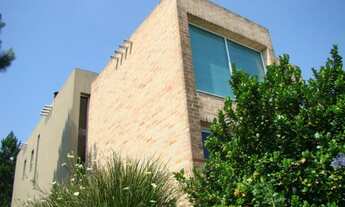 Imagem 4: Loft em condomínio para venda tem 300 metros quadrados com três quartos sendo duas suítes