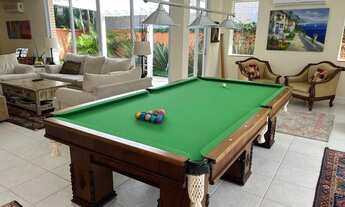 Imagem 2: Casa para venda tem 400 metros quadrados com 5 quartos.