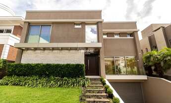 Imagem 2: SOFISTICADA CASA DE ALTO PADRÃO EM CONDOMÍNIO FECHADO - 04 DORMITÓRIOS - 02 SUÍTES - PISO