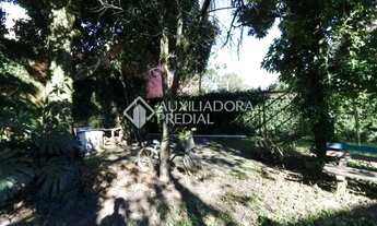 Imagem 2: Excelente terreno na zona Central de Canoas com uma casa com 3 dormitórios, sala de jantar