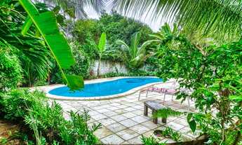 Imagem 5: Casa rústica com piscina numa área verde em Pipa