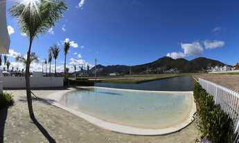 Imagem 7: Lote/Terreno em condomínio fechado com lago ao fundo do lote