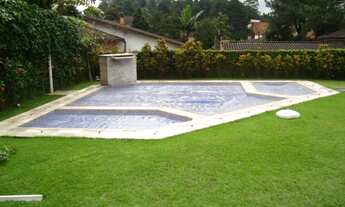 Imagem 3: Casa de condomínio para venda possui 473 metros quadrados com 4 quartos