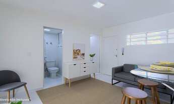 Imagem 4: Apartamento à venda, Pinheiros, com 2 dormitórios e um living integrado à cozinha american