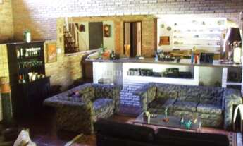 Imagem 6: Casa Rústica em condomínio bem localizado