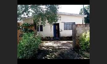 Imagem: Casa murada e forrada