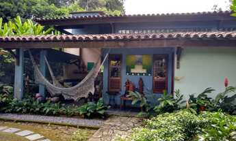 Imagem: Casa com arquitetura rústica e confortável