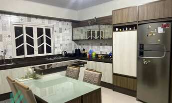 Imagem 2: Venda casa no bairro Nova Brasília em Imbituba SC com edícula mobiliada e ampla área de la