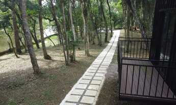 Imagem 4: Chácara em condomínio fechado com casa moderna em meio à natureza