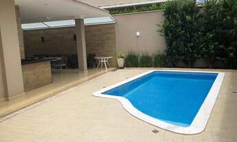 Imagem 2: Casa de condomínio térrea para venda tem 410 metros quadrados com 4 quartos