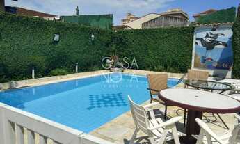 Imagem 3: Casa para venda possui 406 metros quadrados com 3 quartos em Embaré - Santos - SP