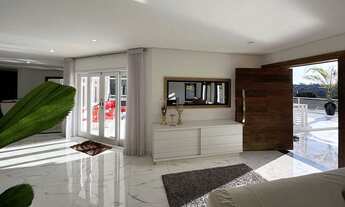 Imagem 5: Casa de condomínio para aluguel e venda possui 428 metros quadrados com 4 quartos