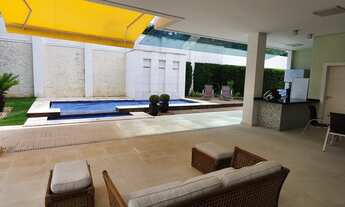 Imagem 2: Casa de condomínio para aluguel e venda possui 586 metros quadrados com 4 quartos