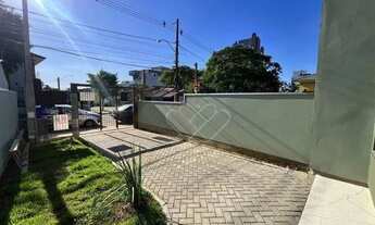 Imagem 5: Sofisticação e Conforto no Coração da Cidade Casa de Alto Padrão com Pátio Privativo