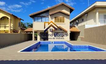 Imagem 6: Casa com linda arquitetura e 5 dormitórios