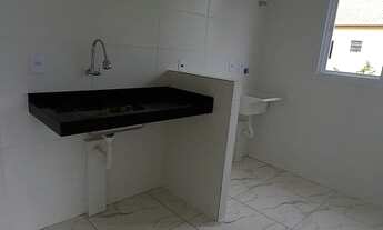 Imagem 2: Casa sobreposta alta de 239 mil por 199 mil no Jardim Melvi em Praia Grande